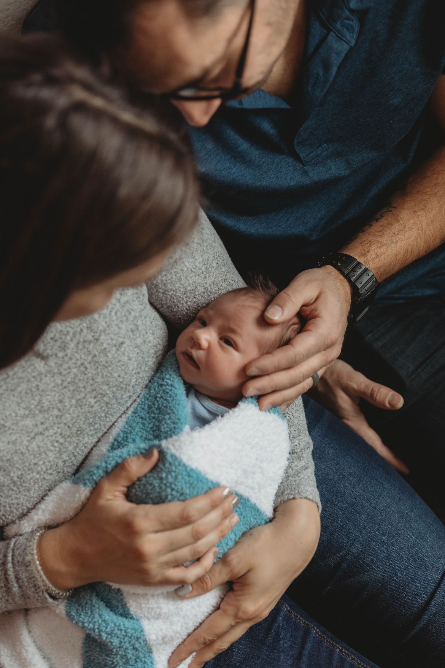 newborn baby with parents