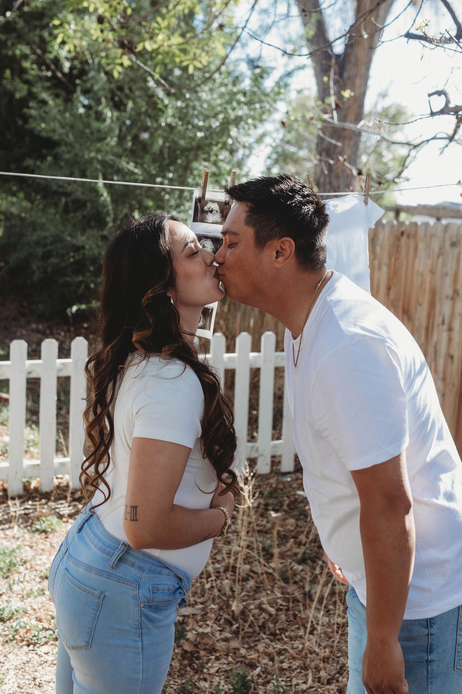 maternity photo with husband and wife