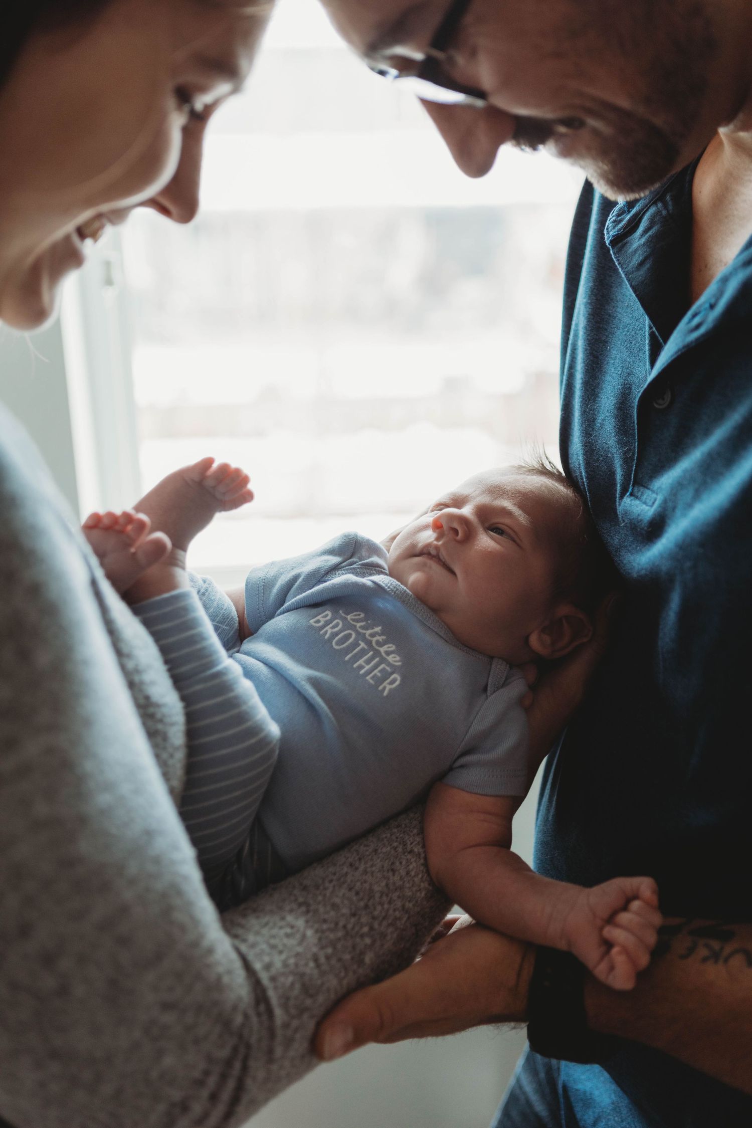newborn baby with parents