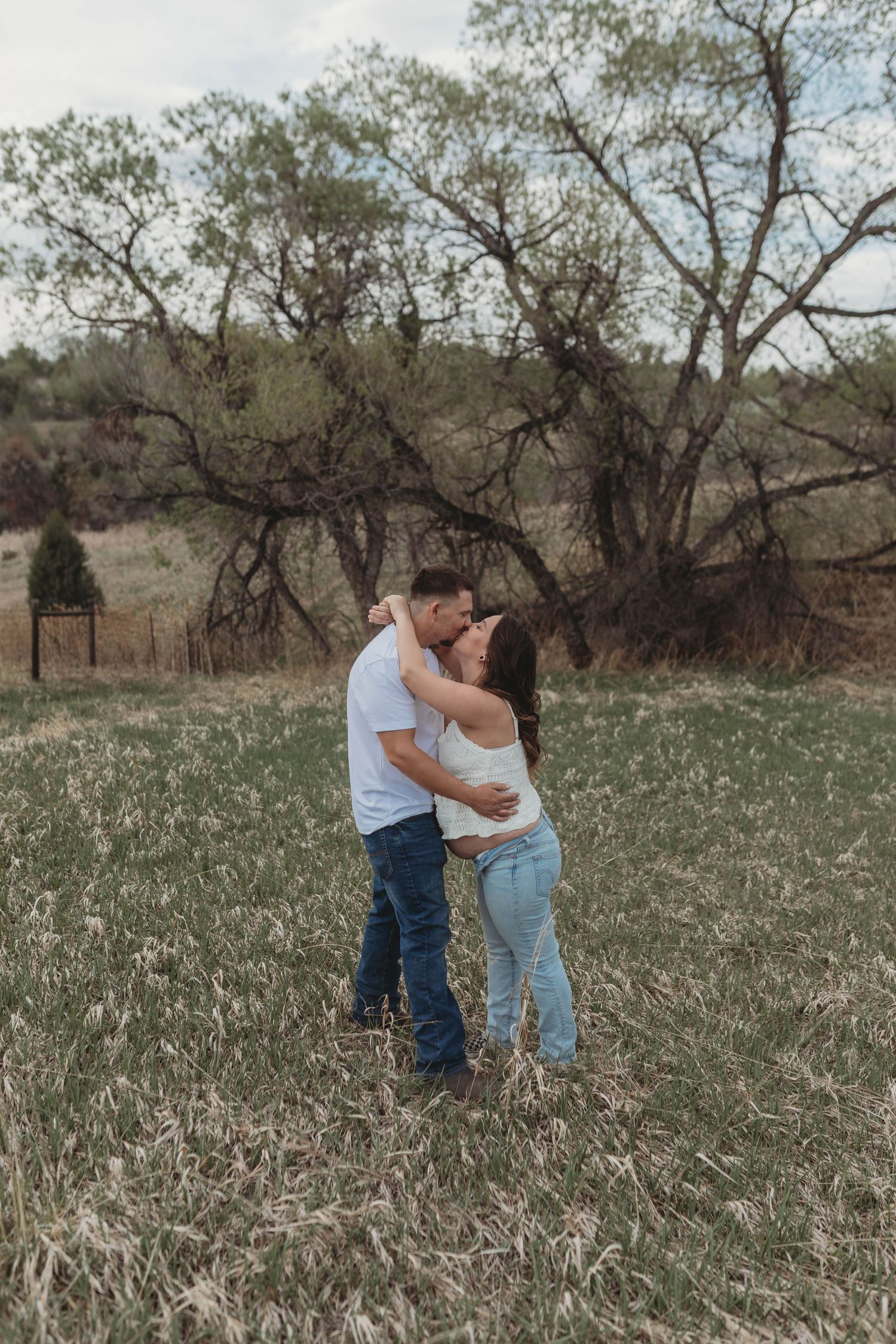 maternity photo with husband and wife