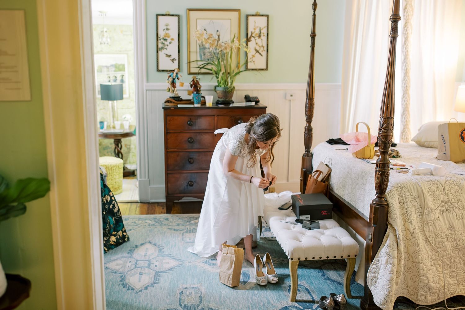 Elegant interior room setup with white linens and vintage furniture for a special occasion.
