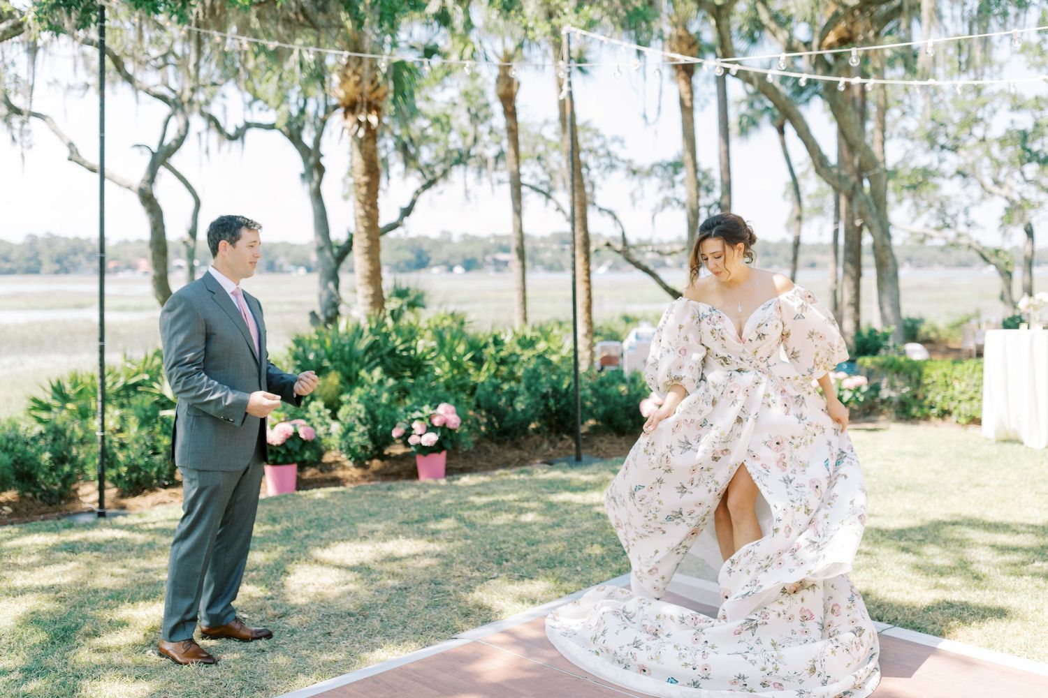 Romantic outdoor wedding photoshoot in a lush garden setting with florals and natural lighting.