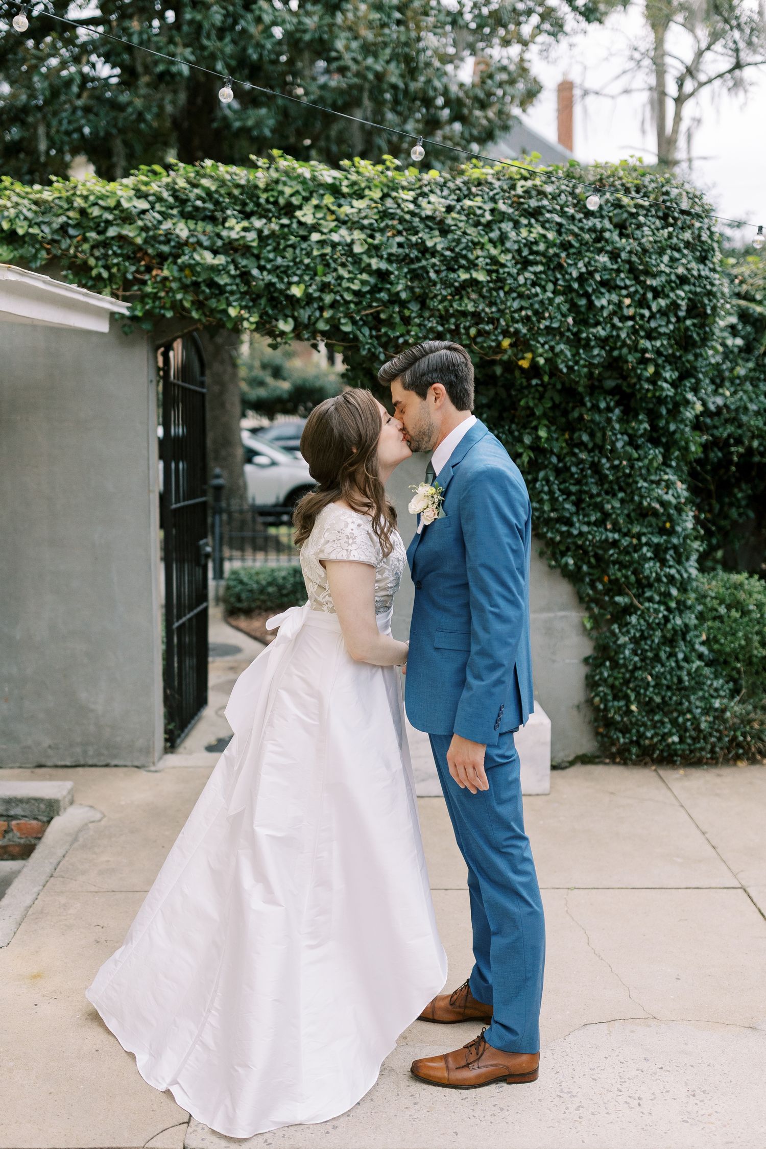 A romantic wedding photo sequence showing a couple in a white dress and blue suit sharing intimate moments against greenery.
