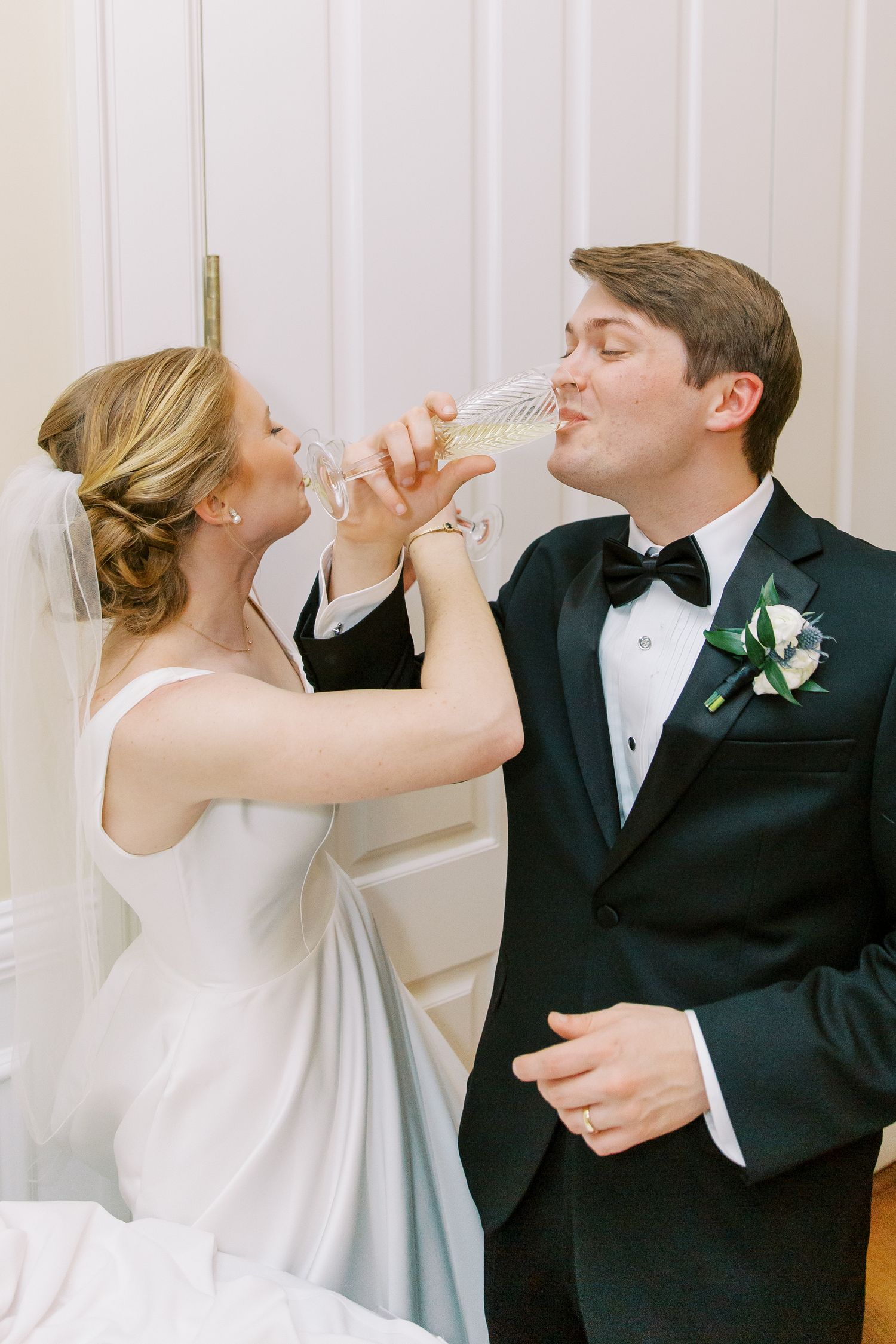 A sequence of candid moments showing a couple sharing champagne during their wedding celebration.