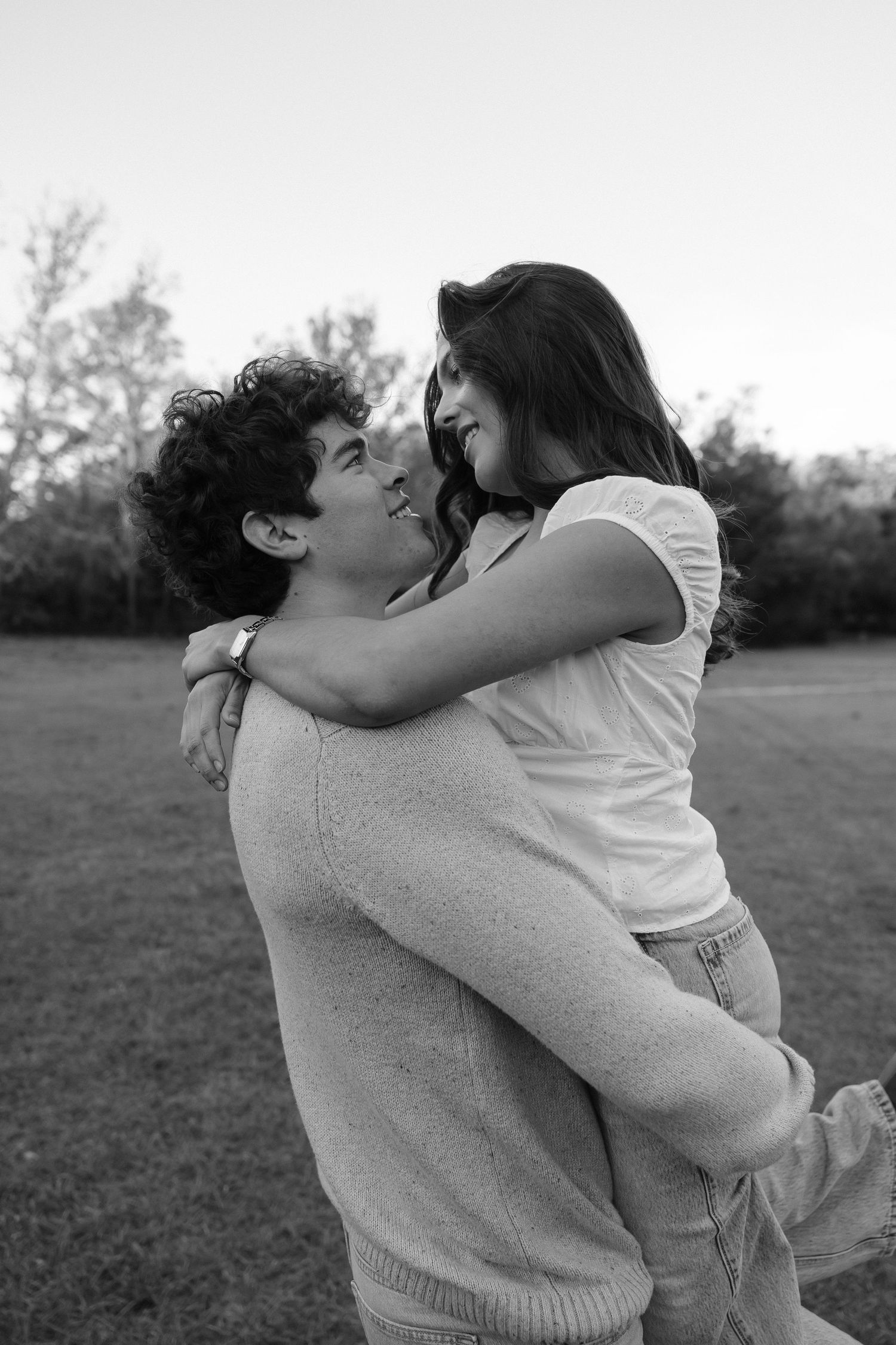 Young couple at Philippe Park takes their anniversary couples photos in a B&W taken by couples photographer Michaela Gom Photography.