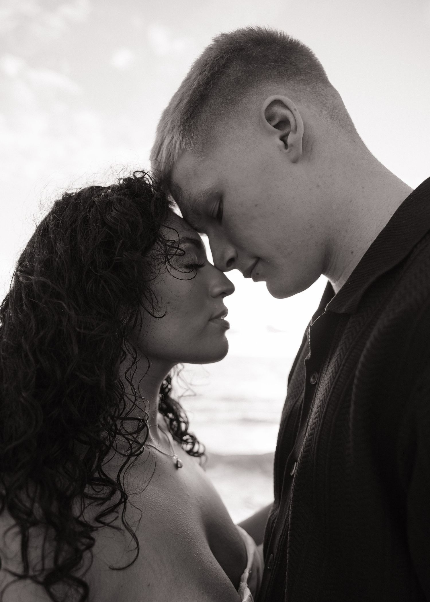 A engaged couple is captured in Black and White editing by timeless photographer Michaela Gom Photographer.