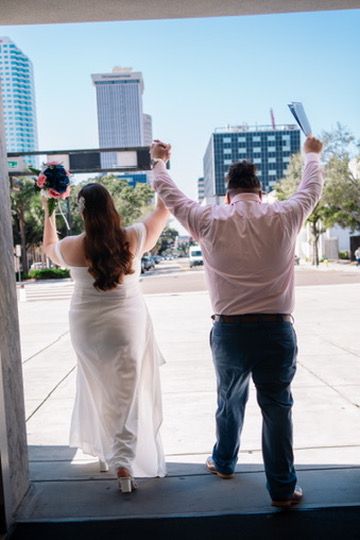 A sequence of three photos showing people raising their arms in celebration against a cityscape backdrop.