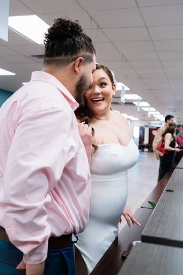 A sequence of photos showing two people embracing and laughing together in an office setting.