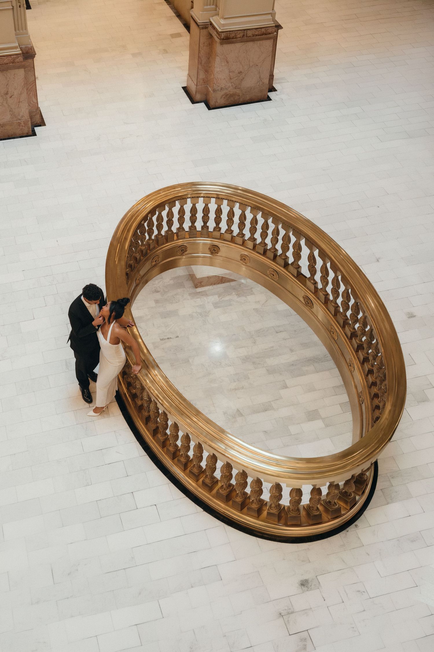 A series of photos showing a curved wooden railing installation process on a light-colored hardwood floor.