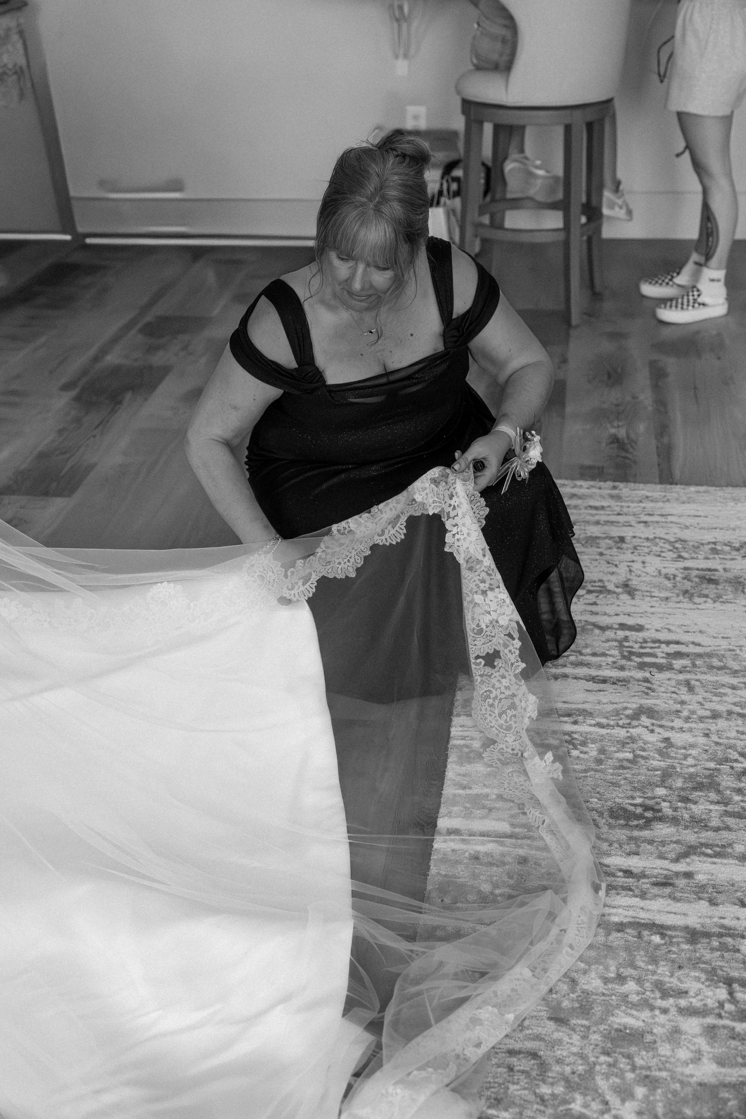 Black and white photo series showing the graceful movement of a flowing wedding veil.