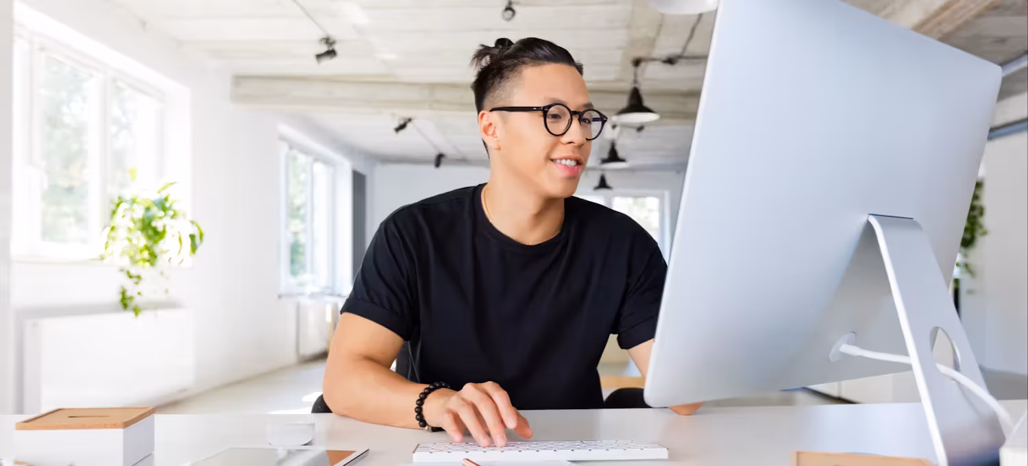 man looking at computer