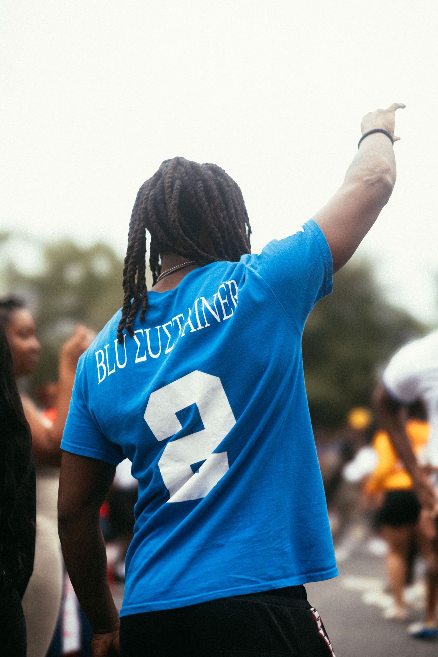 Person in bright blue jersey with the number 2 visible is shown from different angles.  USC Hip Hop Wednesday