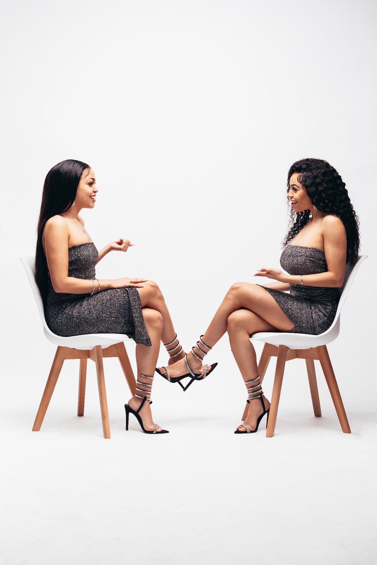 A photo sequence showing different angles of a person wearing a sparkly dress and heels sitting in a modern wooden chair.