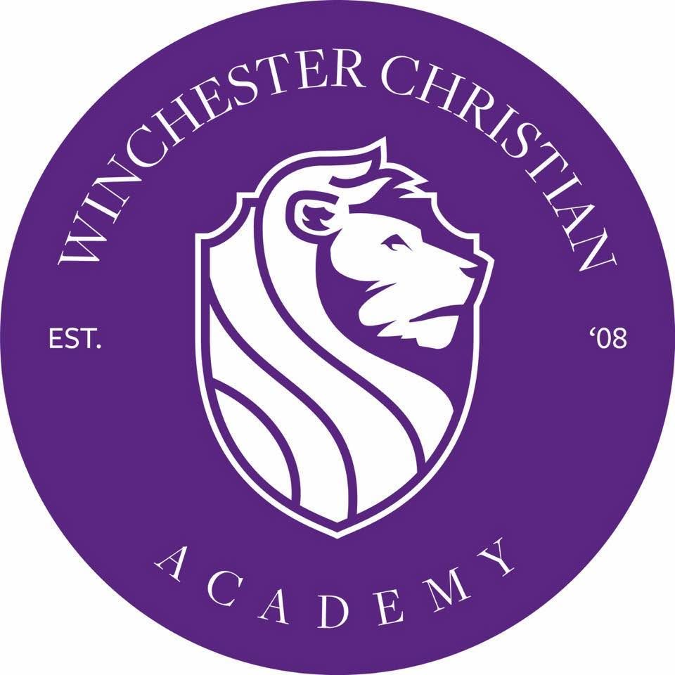 Winchester Christian Academy purple circular logo featuring a lion shield emblem, established 2008.