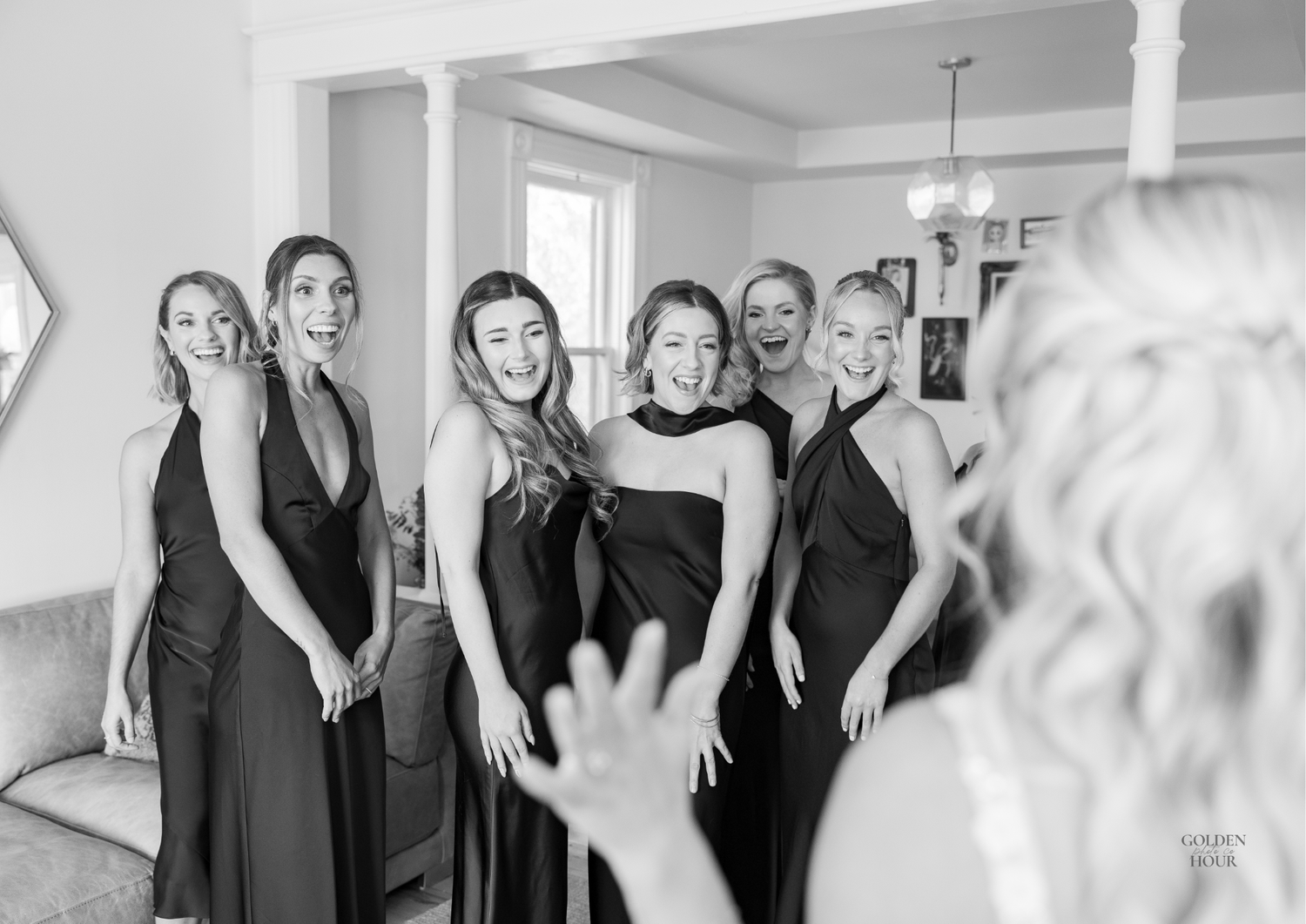 First look with bridesmaids in Prince Edward County, Ontario at The Brighthouse Farm.