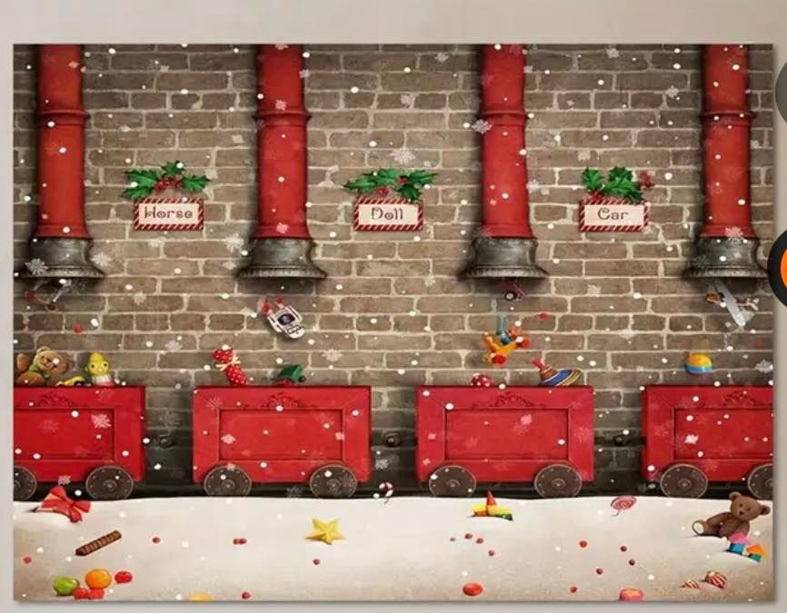 A festive Christmas border design with red columns against a brick wall decorated with holly and ornaments.