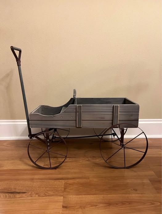 Antique wooden wagon with metal wheels