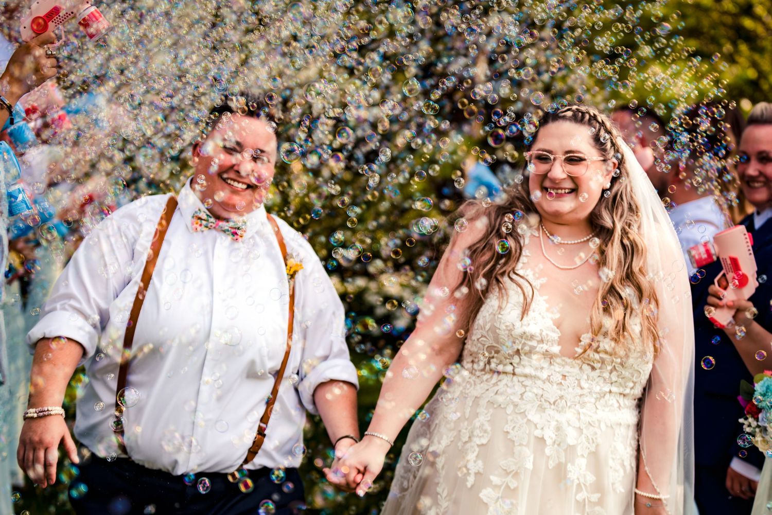 Wedding celebration with confetti and sunflowers in an outdoor garden setting. Taken by Rhode island wedding photographer