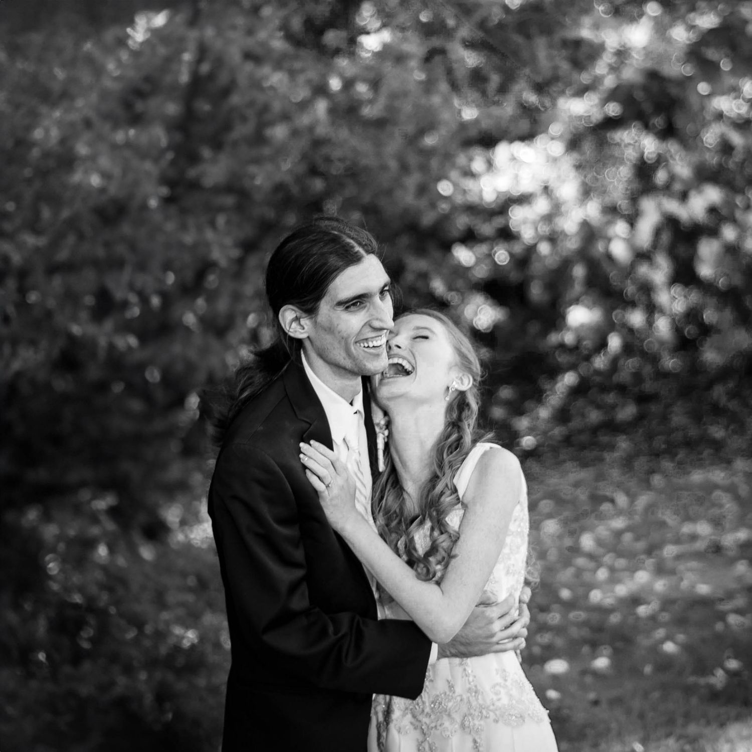 Black and white wedding portrait series captured in a natural outdoor setting. Taken by Rhode Island Photographer