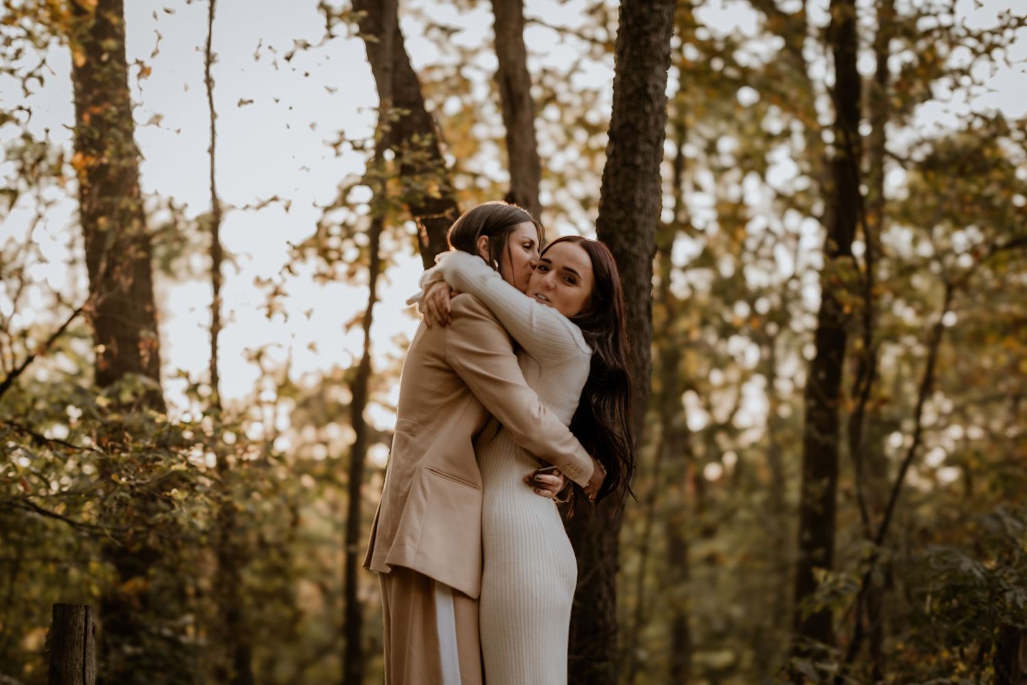 An intimate outdoor photoshoot capturing romantic moments between a couple.