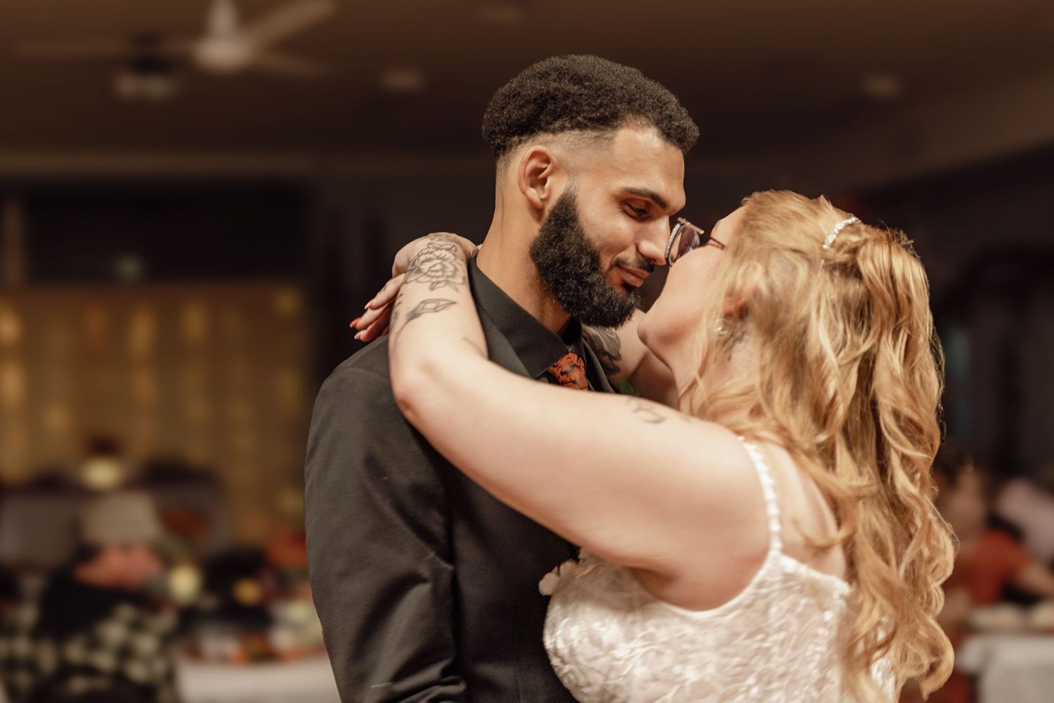 A couple in formal wedding attire share romantic dance moves in a sequence of photos.