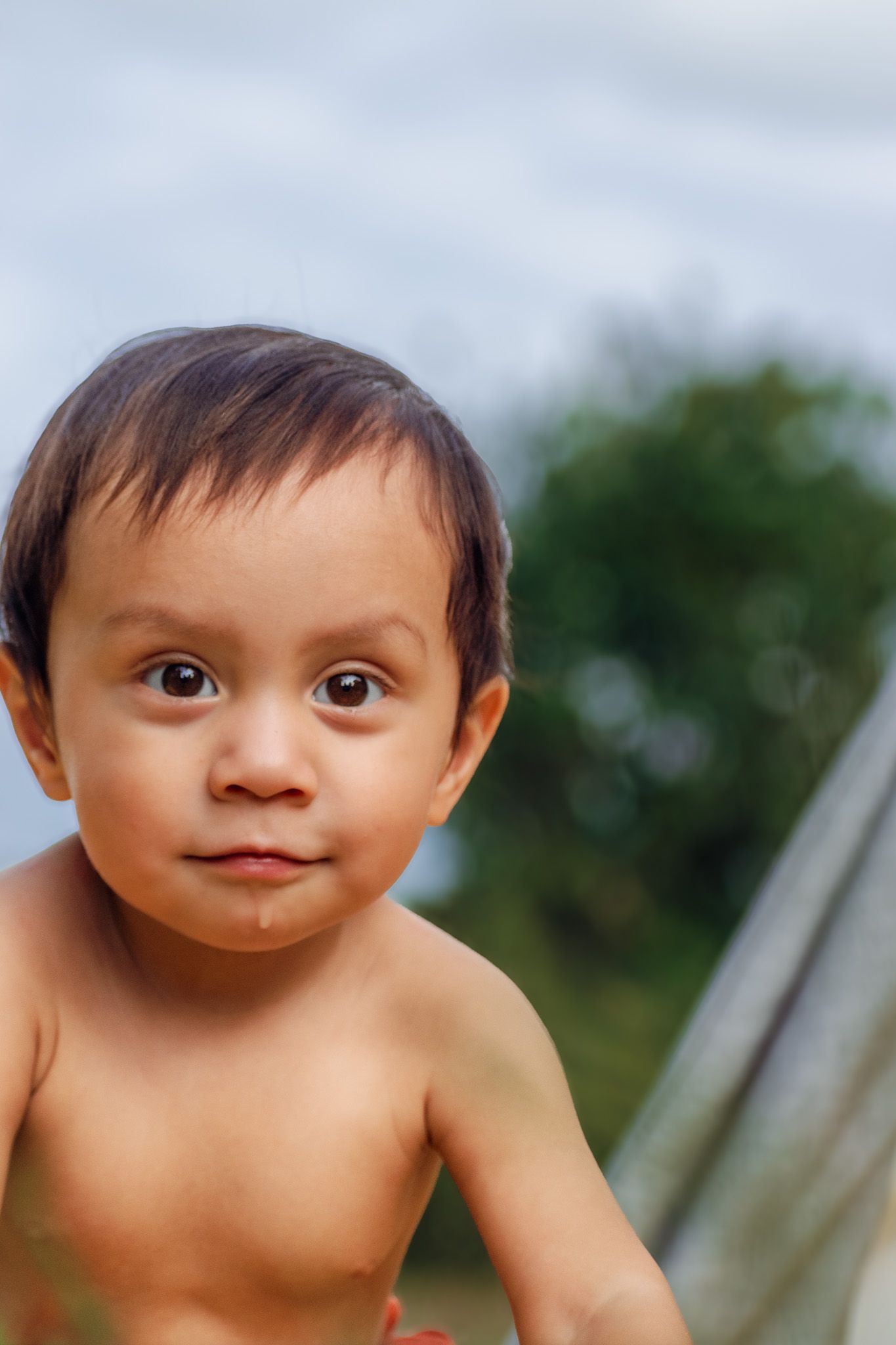 Close-up portrait against soft blurred background.