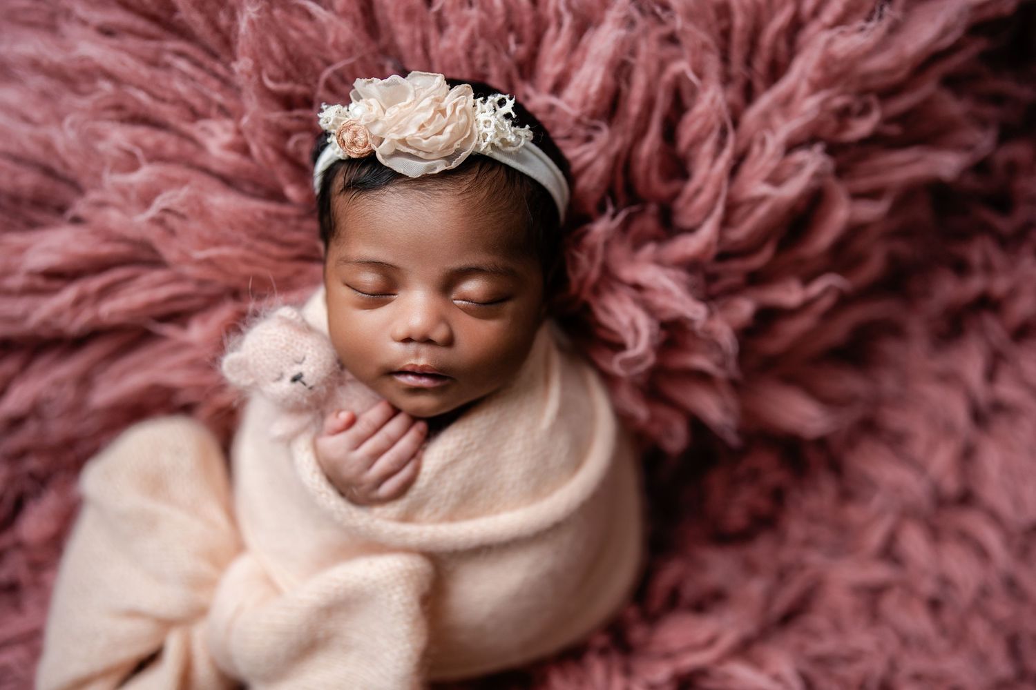 Metro Detroit newborn photographer capturing a peaceful newborn portrait in studio