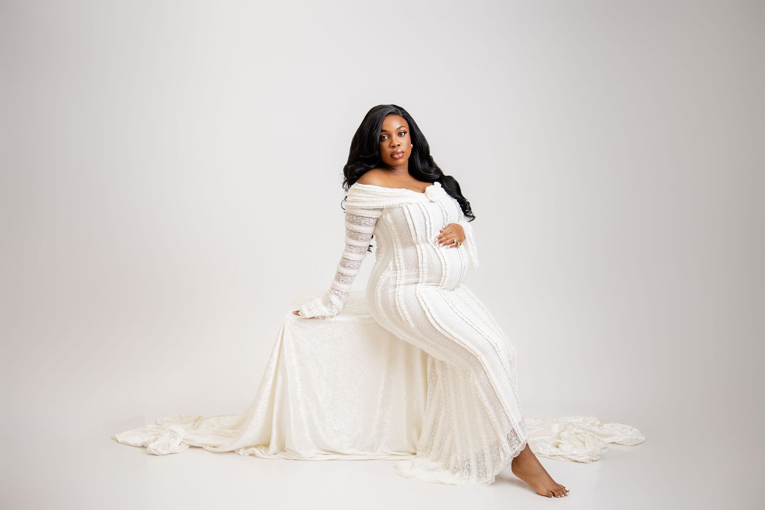 Metro Detroit maternity photographer capturing an expecting mother in studio