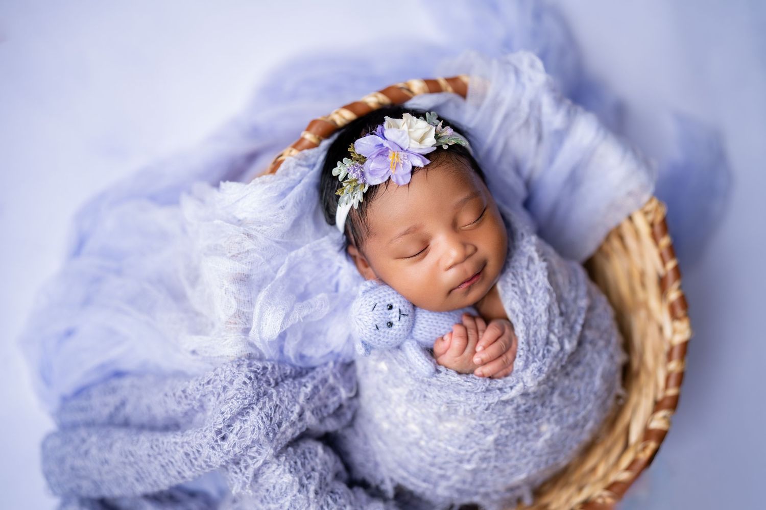 Metro Detroit newborn photographer capturing a peaceful newborn portrait in studio