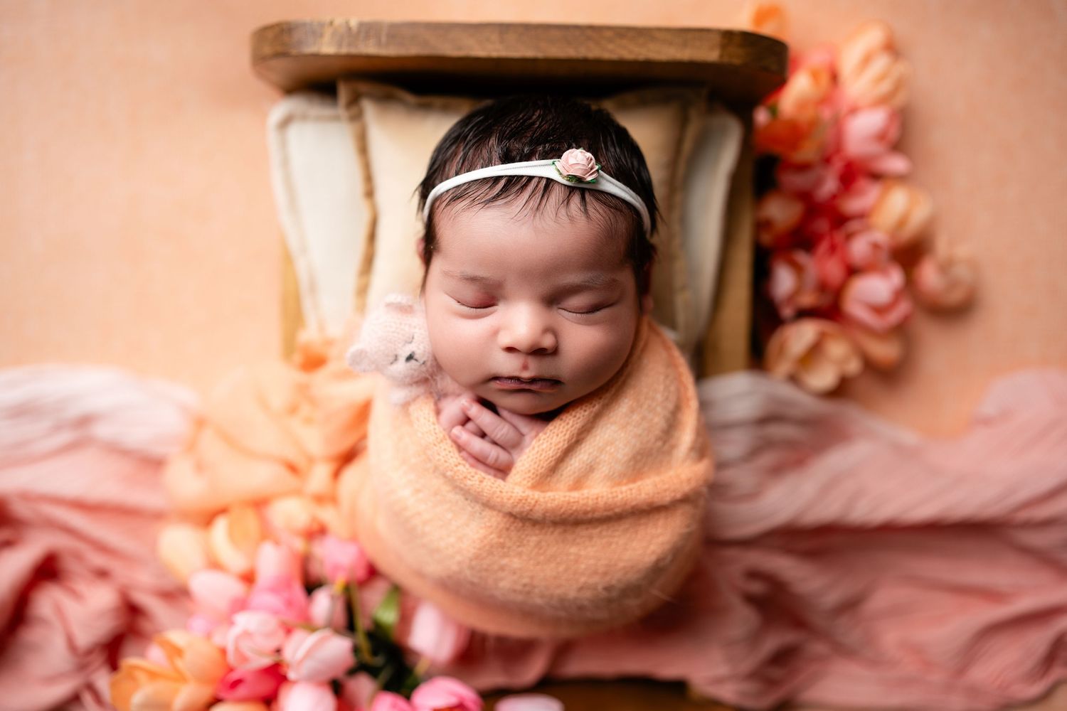 Metro Detroit newborn photographer capturing a peaceful newborn portrait in studio