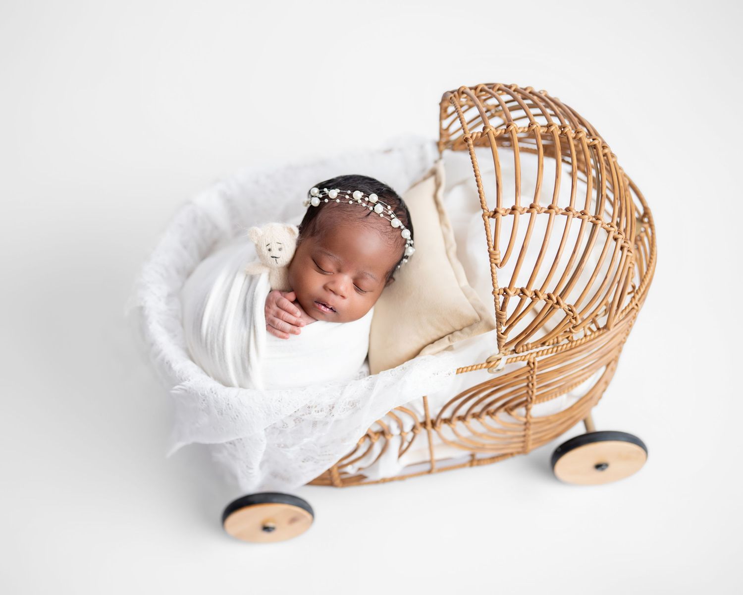 Metro Detroit newborn photographer capturing a peaceful newborn portrait in studio