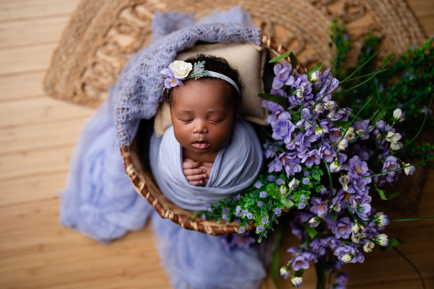 Metro Detroit newborn photographer capturing a peaceful newborn portrait in studio