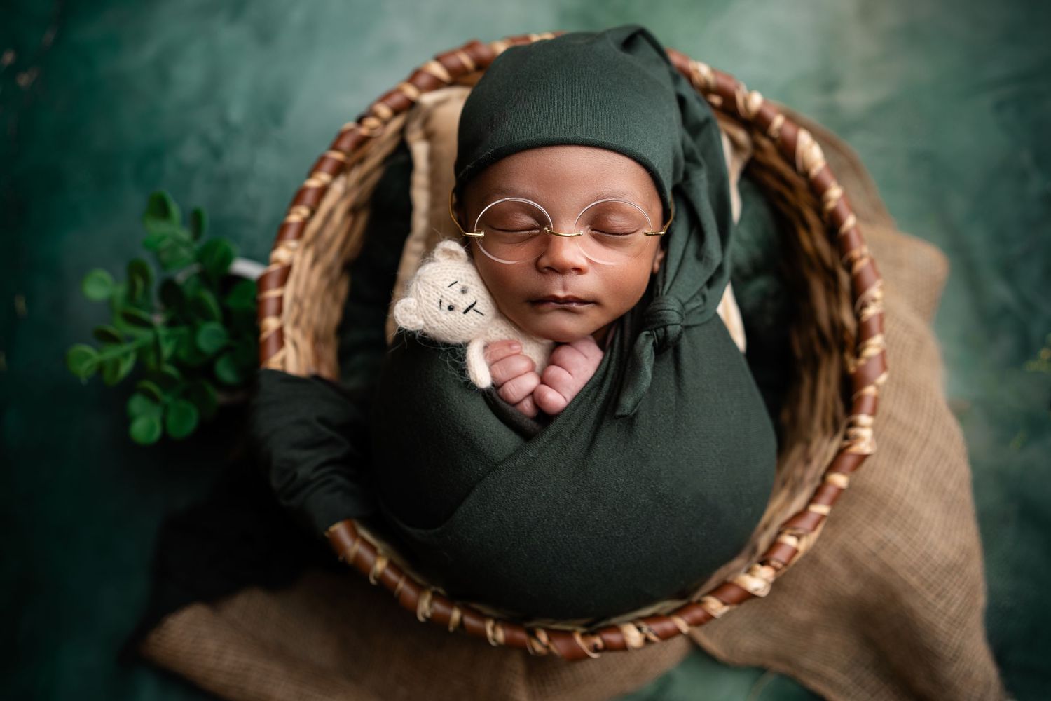 Metro Detroit newborn photographer capturing a peaceful newborn portrait in studio