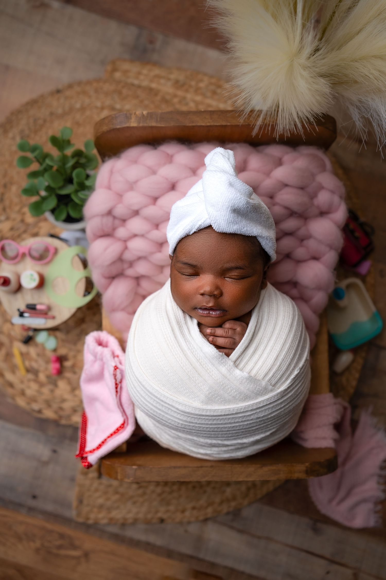 Metro Detroit newborn photographer capturing a peaceful newborn portrait in studio