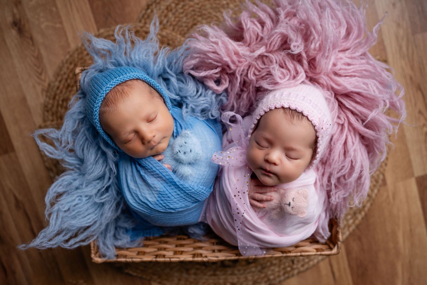 Metro Detroit newborn photographer capturing a peaceful newborn twins portrait in studio