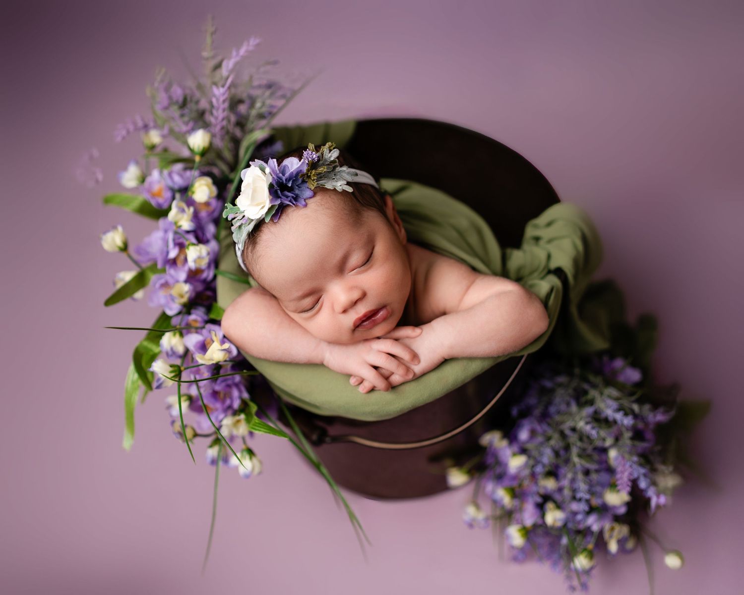 Metro Detroit newborn photographer capturing a peaceful newborn portrait in studio
