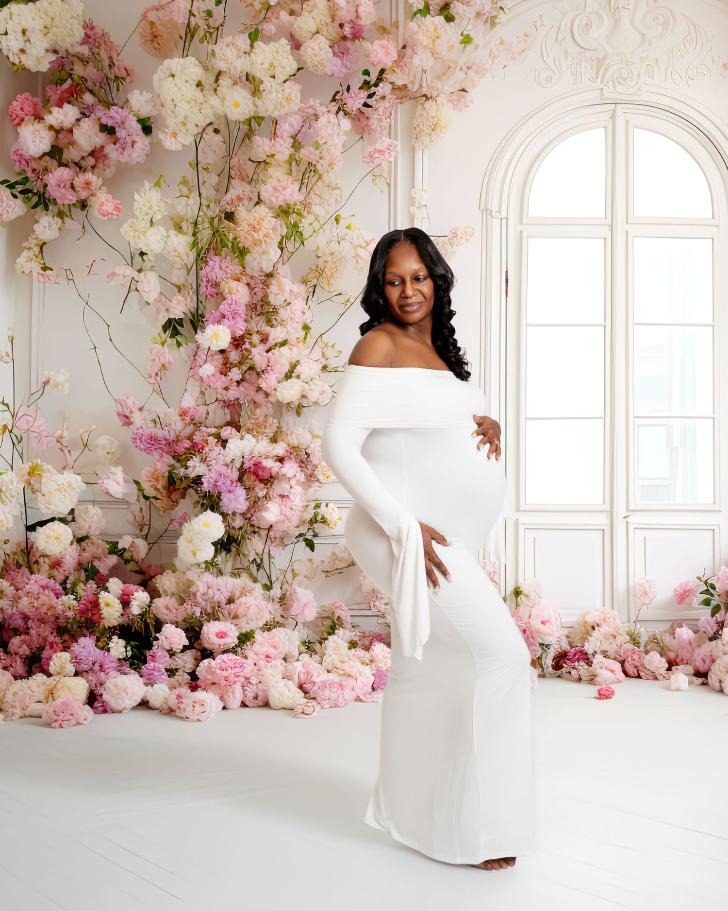 Metro Detroit maternity photographer capturing an expecting mother in studio