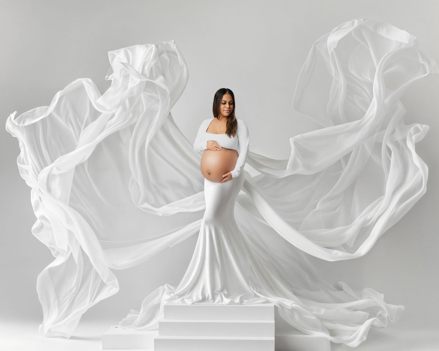 Metro Detroit maternity photographer capturing an expecting mother in studio