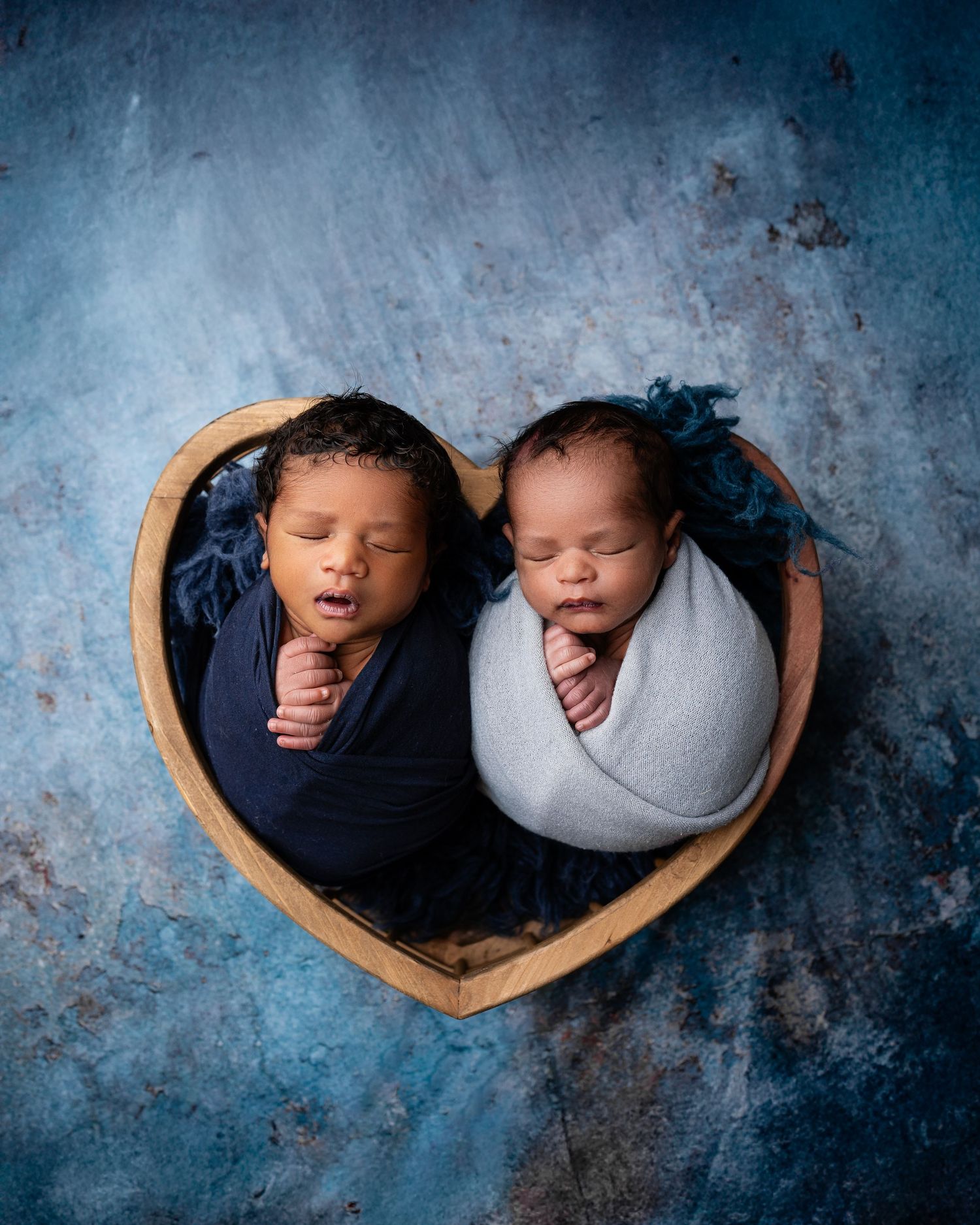 Metro Detroit newborn photographer capturing a peaceful newborn portrait in studio