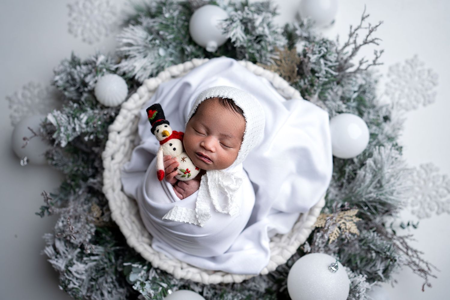 Metro Detroit newborn photographer capturing a peaceful newborn portrait in studio