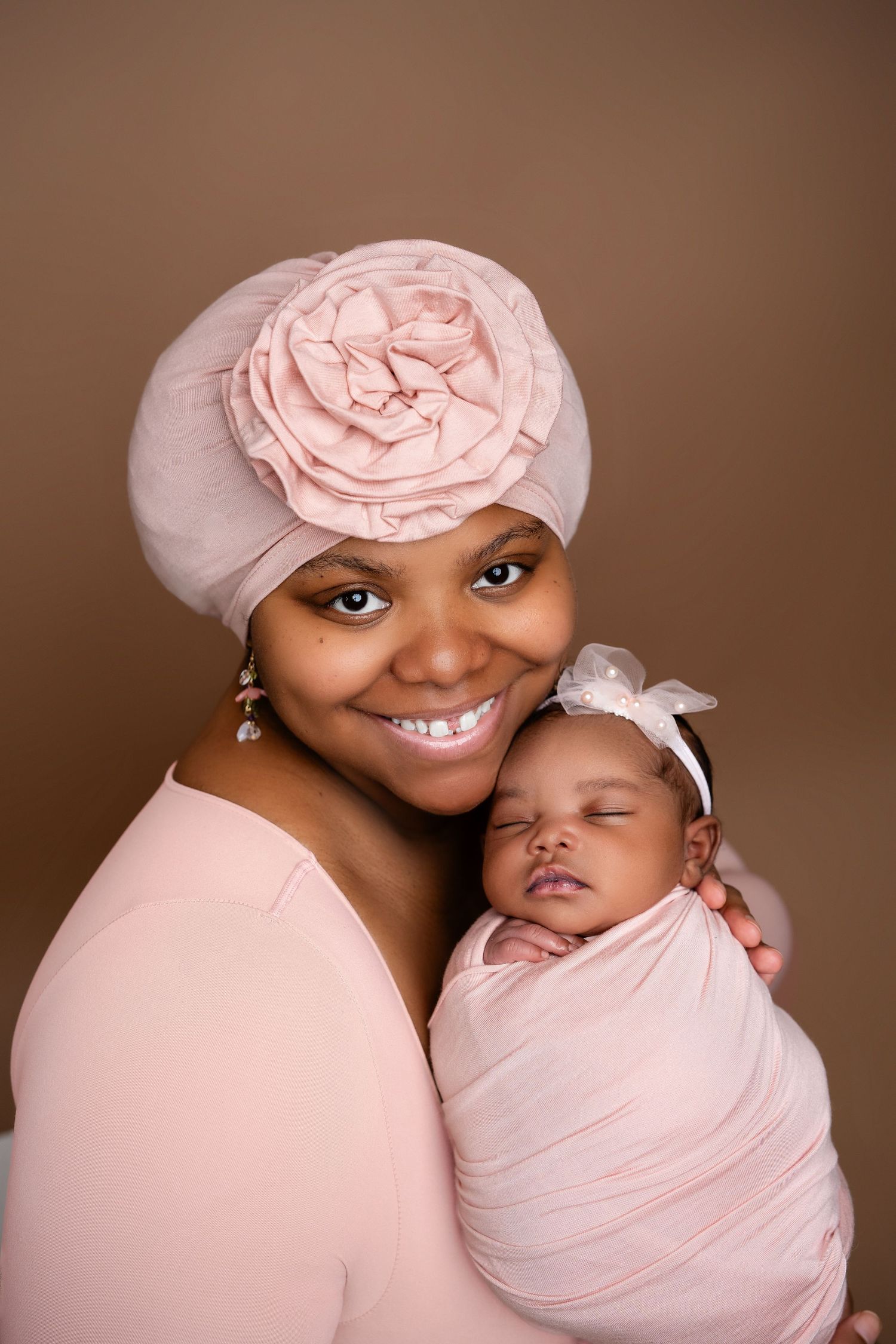 Metro Detroit newborn photographer capturing a peaceful newborn portrait in studio