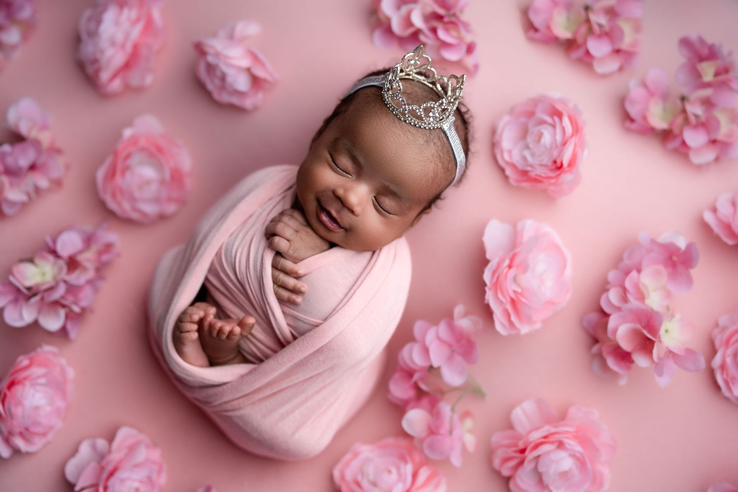 Metro Detroit newborn photographer capturing a peaceful newborn portrait in studio