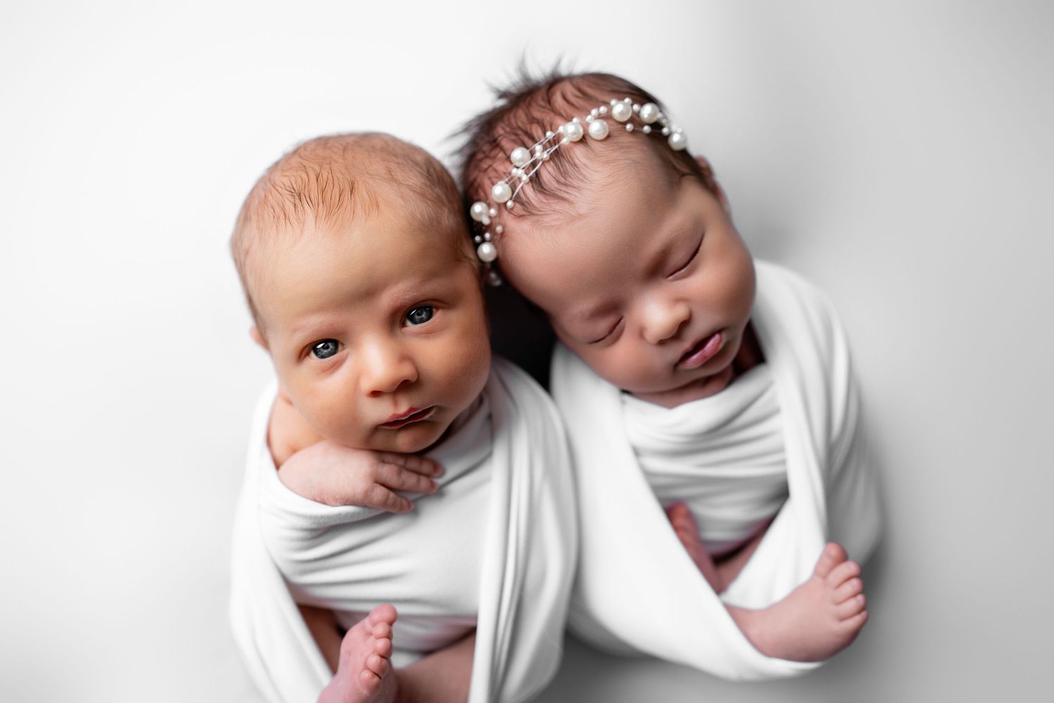 Metro Detroit newborn photographer capturing a peaceful newborn portrait in studio