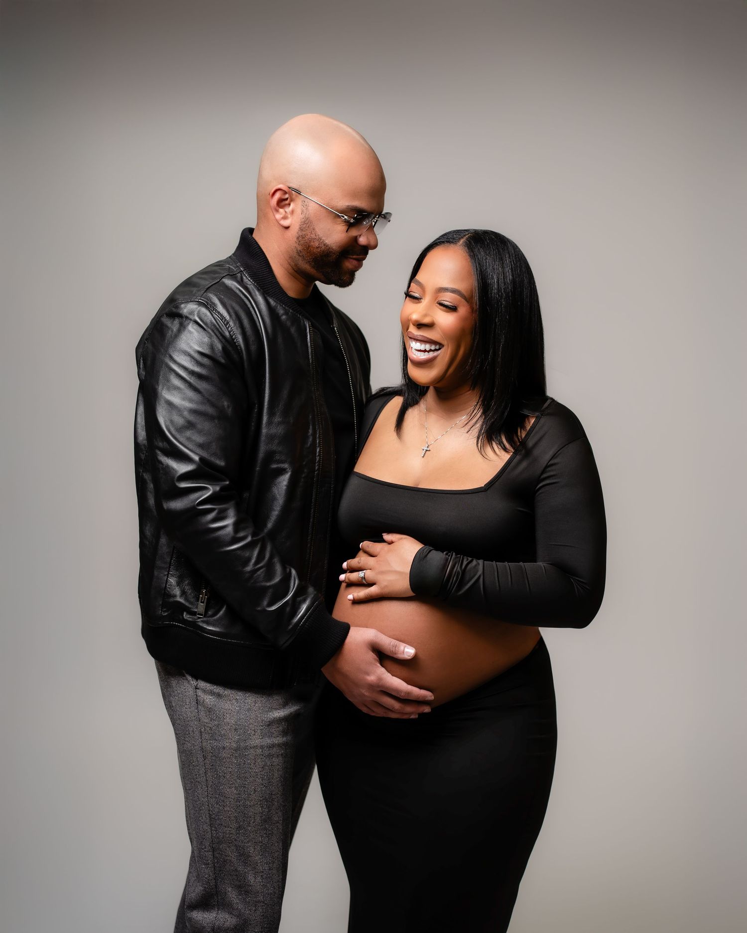 Metro Detroit maternity photographer capturing an expecting mother in studio