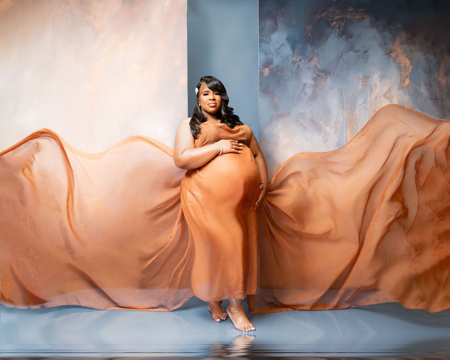 Metro Detroit maternity photographer capturing an expecting mother in studio