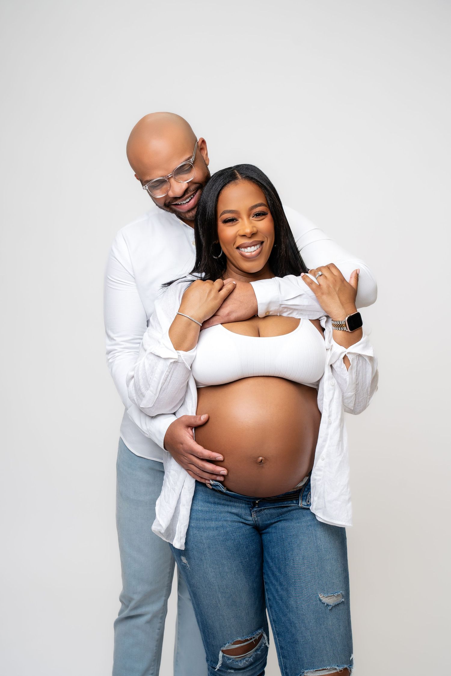 Metro Detroit maternity photographer capturing an expecting mother in studio