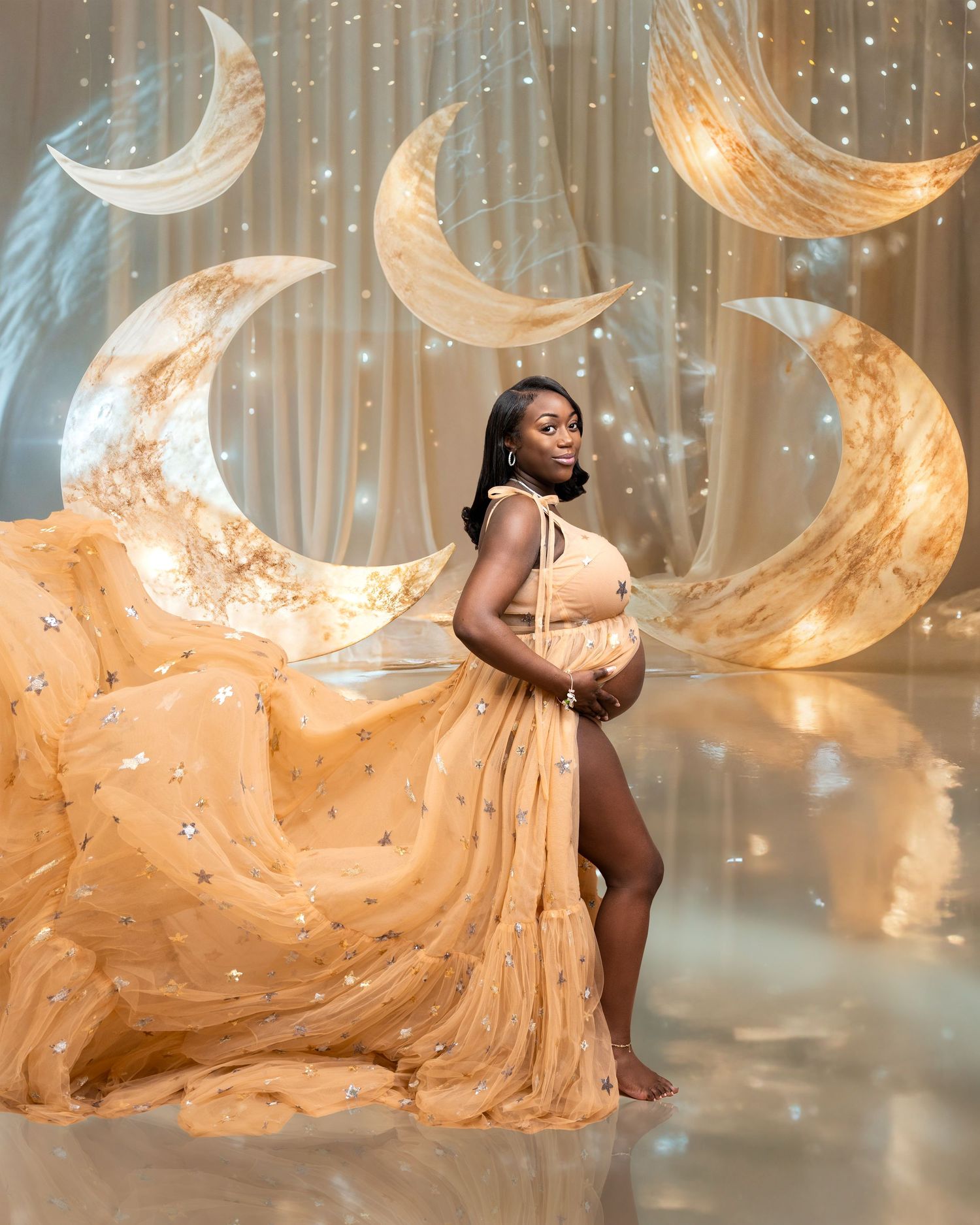 Metro Detroit maternity photographer capturing an expecting mother in studio