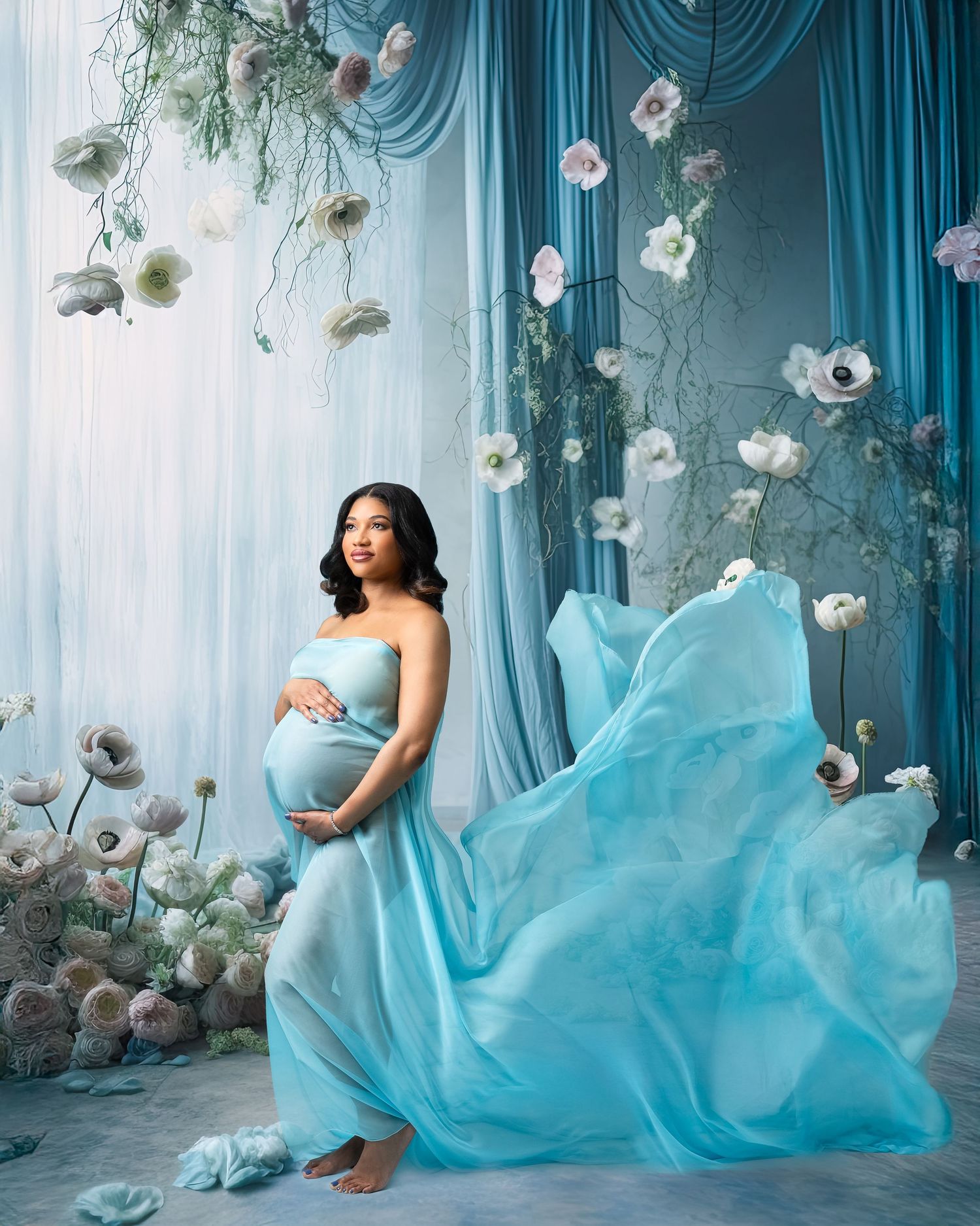 Metro Detroit maternity photographer capturing an expecting mother in studio