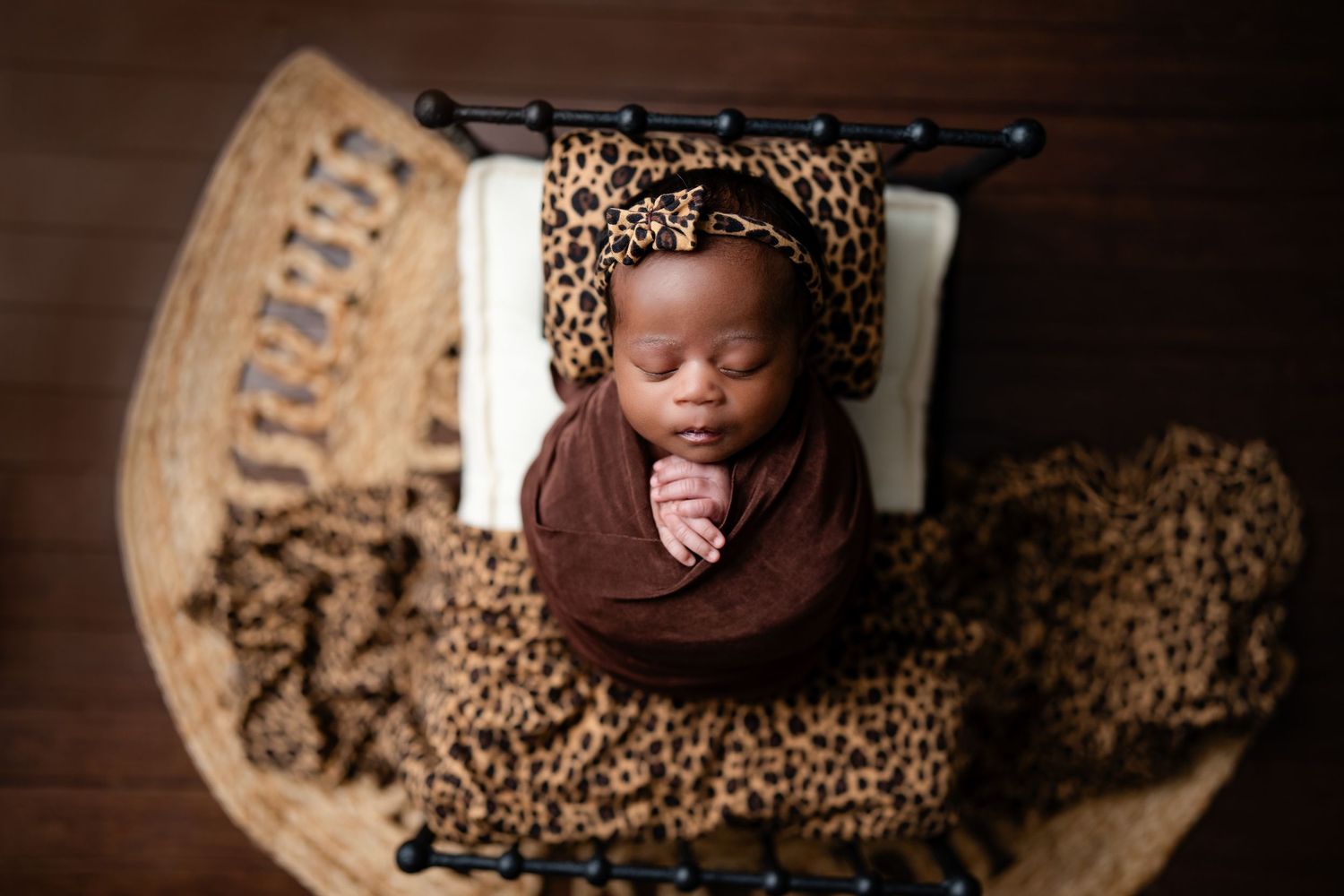 Metro Detroit newborn photographer capturing a peaceful newborn portrait in studio