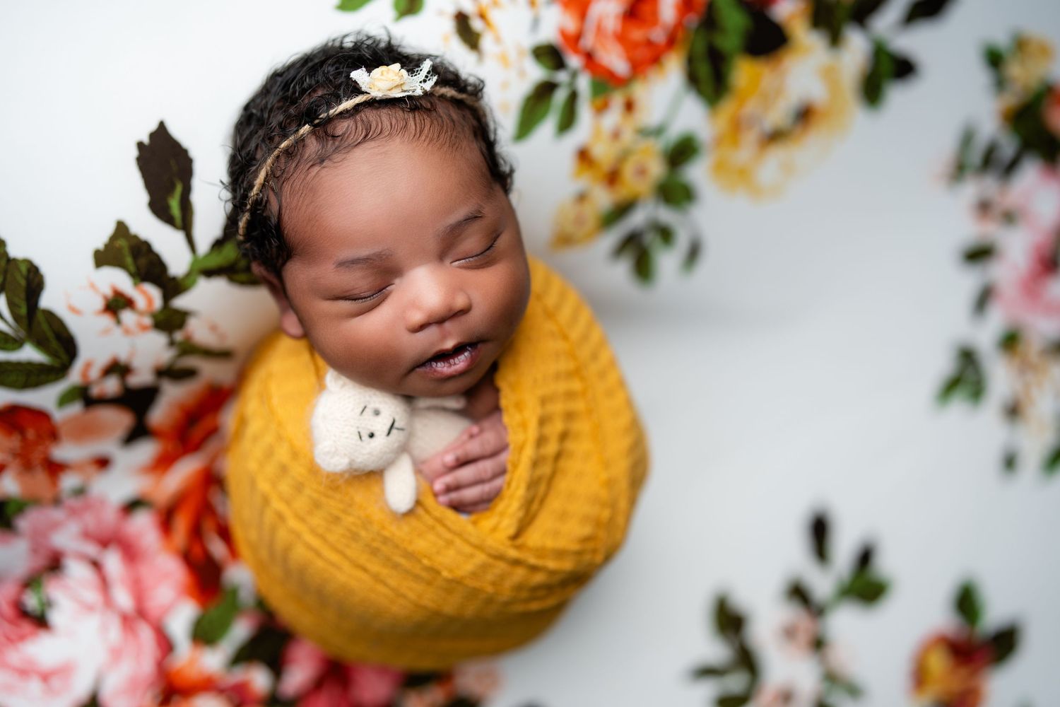 Metro Detroit newborn photographer capturing a peaceful newborn portrait in studio
